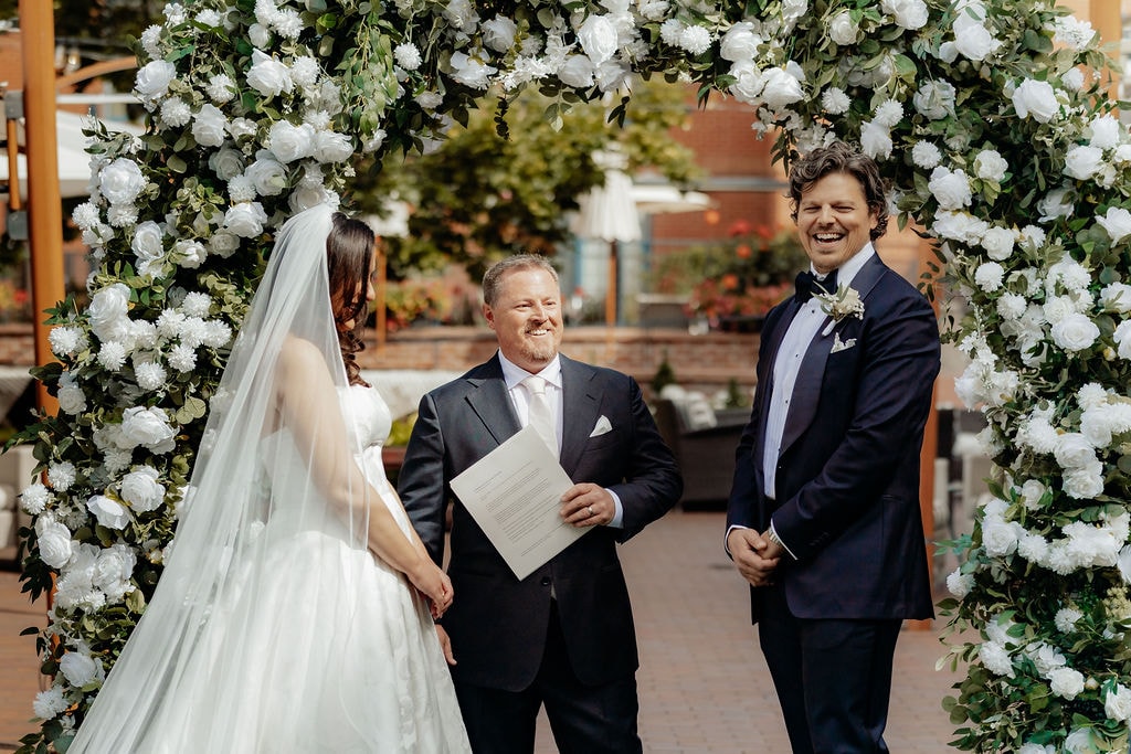 Wedding ceremony floral arch and décor